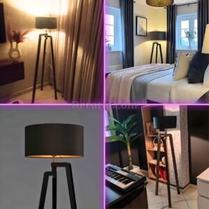 مصباح أرضي, بثلاث قوائم من الخشب الطبيعي وغلاف أسود.